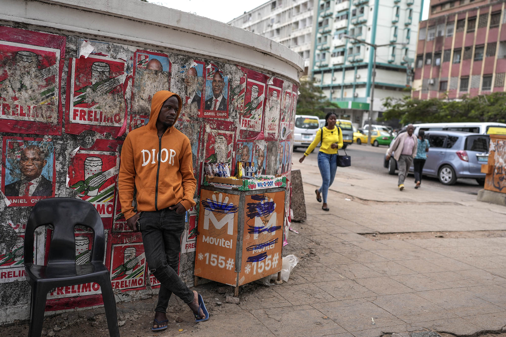 A wall plastered with election campaign posters for Daniel Francisco Chapo, the candidate for the governing party, Frelimo, in Maputo, Mozambique, on Oct. 8, 2024. (Joao Silva/The New York Times)