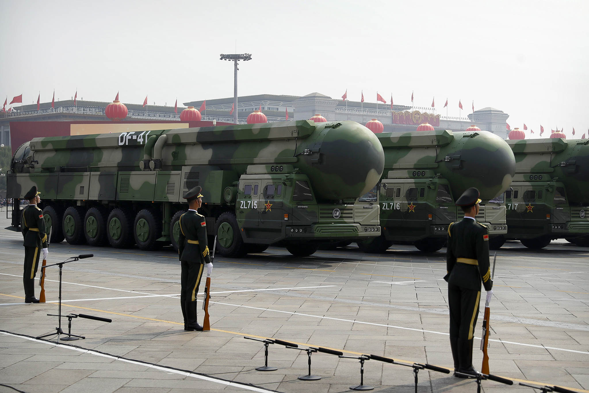 Trucks carry ballistic missiles during a parade commemorating the founding of the People’s Republic of China in Beijing, on October 1, 2019. (Photo by Mark Schiefelbein/AP)