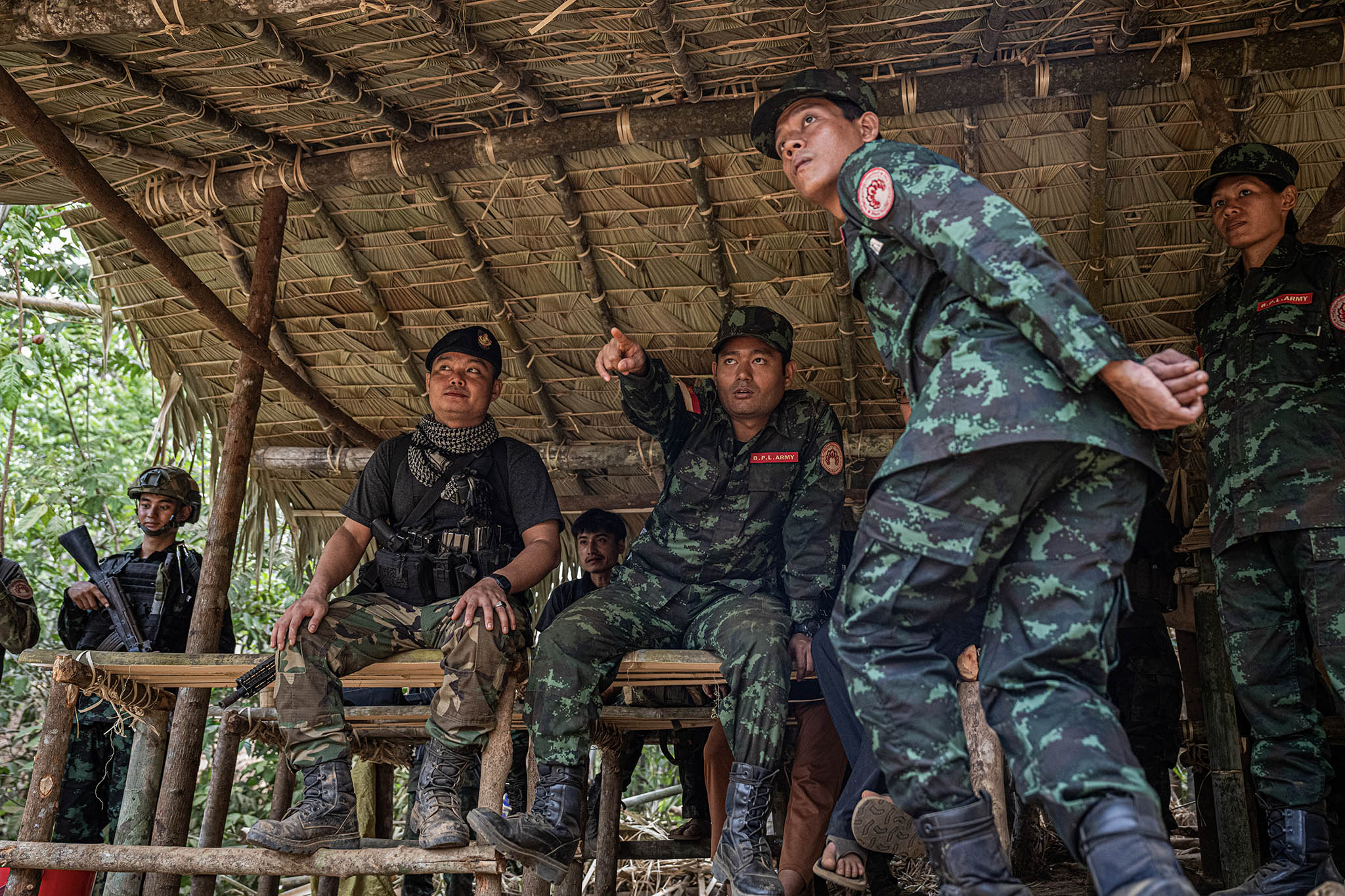 A rebel commander in Myanmar, on the first day of training for new recruits in Karen State, on May 7, 2024. (Daniel Berehulak/The New York Times)