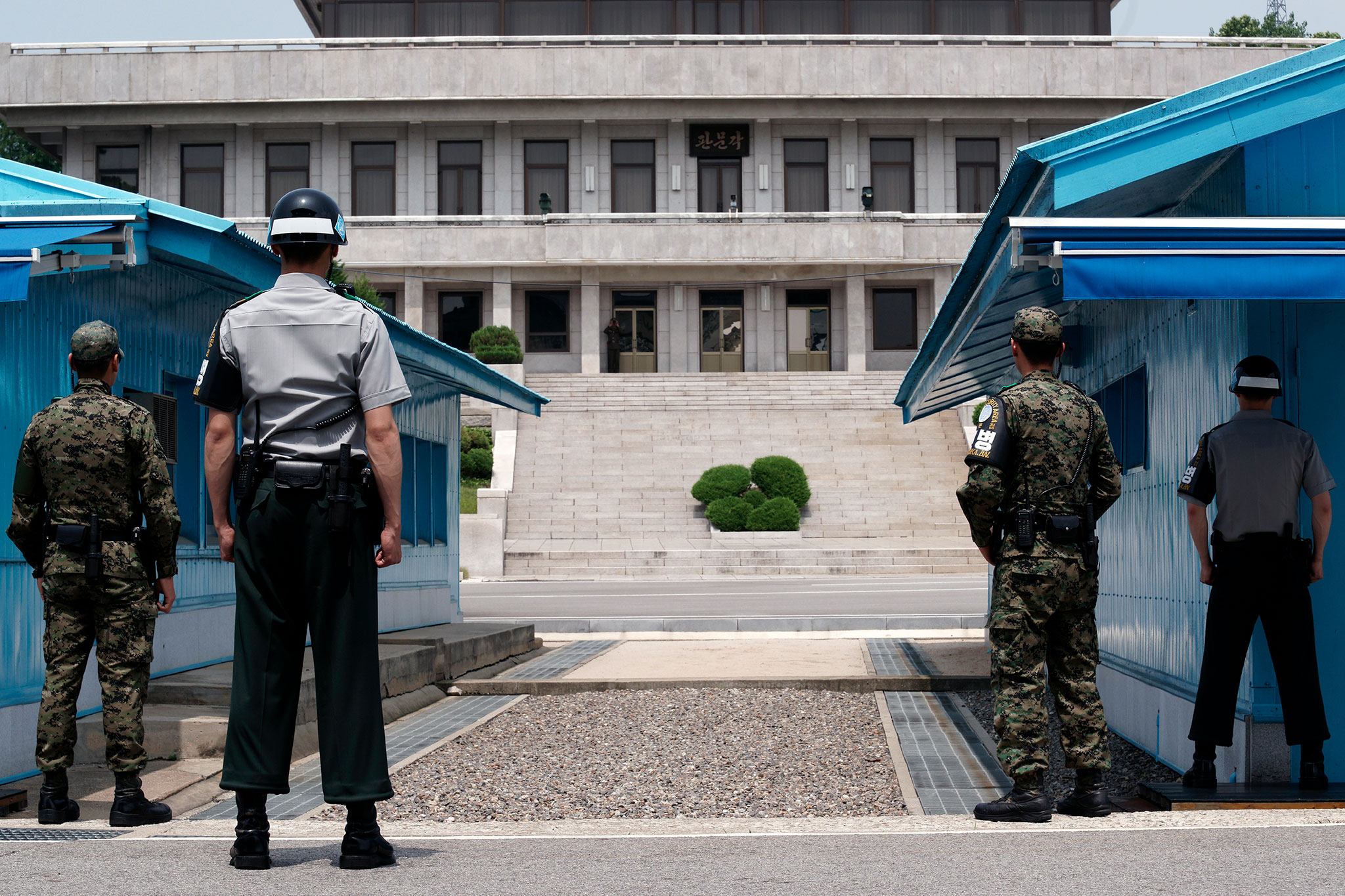 South Korean soldiers stand guard facing North Korea at the Joint Security Area in Panmunjom in the Demilitarized Zone between North and South Korea, June 25, 2014. (Woohae Cho/The New York Times)
