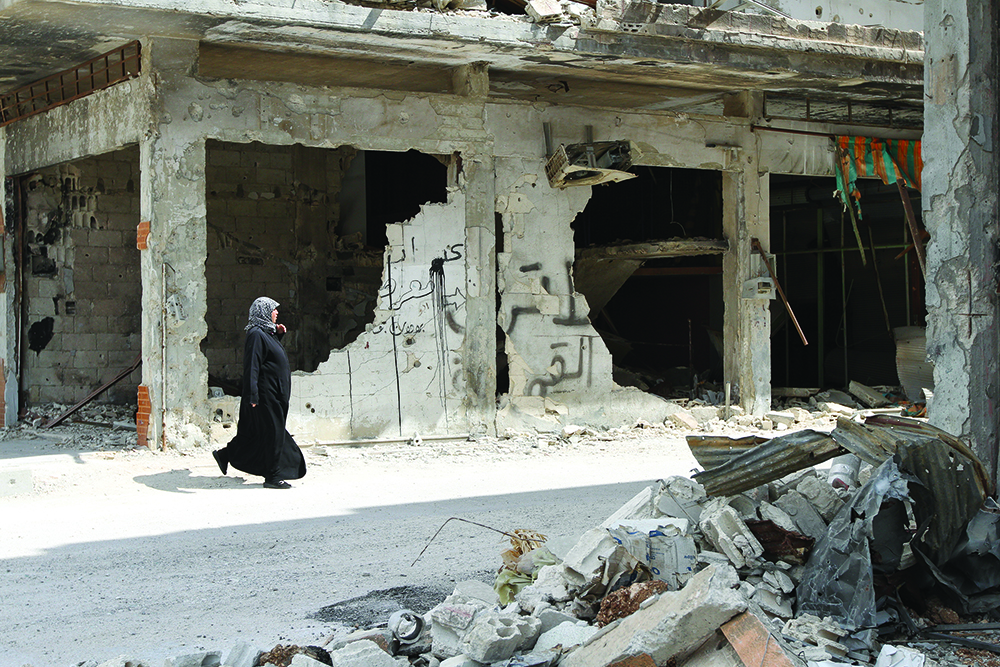 Destruction in Homs, Syria. Photograph by bwb- studio, iStock by Getty Images.