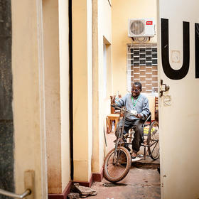 A Baagui National Forum participant leaves a radio station after an interview that highlighted the effects of the conflict on persons with disabilities in Central African Republic. May 7, 2015. (Catianne Tijerinn/U.N. Photo)