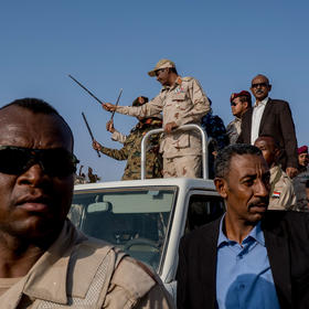 Lt. Gen. Mohamed Hamdan, center, also known as Hemeti, the de-facto ruler of Sudan, atop a truck during a rally in Galawee, Sudan, June 15, 2019. (Declan Walsh/The New York Times)
