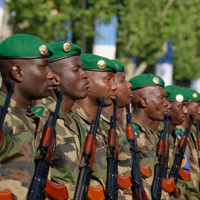 Malian troops taking part in the Bastille Day 2013 military parade on the Champs-Élysées in Paris. Since August 2020, Mali’s military has overthrown two civilian-led governments. (Marie-Lan Nguyen/Wikimedia Commons/CC-BY 2.5]