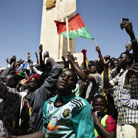 Youth massed in Burkina Faso’s capital after the army ousted the elected government. Five coups in nine months around Africa’s Sahel region reflect a need for better support for democratic governance in fragile states. (Malin Fezehai/The New York Times)
