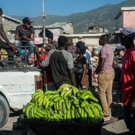 Street vendors in Cape Haitien, Haiti, July 16, 2021. A cycle of crisis and U.S. intervention in Haiti has persisted for decades, but a new U.S. plan is focused on the long term challenges facing Haiti. (Federico Rios/The New York Times)