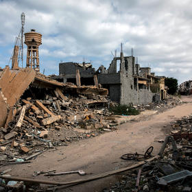 Sirte, the former hometown and stronghold of Muammar Qaddafi, stood in ruins in 2020 after battles between Libyan factions. In other locales, local Libyan peacebuilders have been able to halt or avert warfare. (Ivor Prickett/The New York Times)