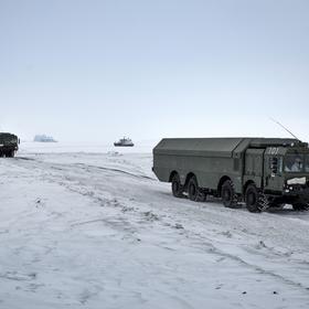Russia’s military moves mobile missile launchers in its Arctic region in 2021. The government of President Vladimir Putin has asserted a right to use nuclear weapons in the Ukraine war. (Emile Ducke/The New York Times)