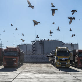 Trucks loaded with wheat at Ukraine's Port of Mykolaiv, Feb. 2022. The U.N. warned April 16 that closures of ports on the Black Sea could trigger a global food catastrophe that yields starvation, migration and political instability. (The New York Times)