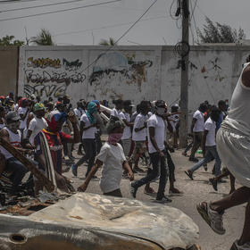 Members of the G9 gang protest the assassination of Haitian President Jovenel Moise in Port-au-Prince. July 26, 2021. (Victor Moriyama/The New York Times)