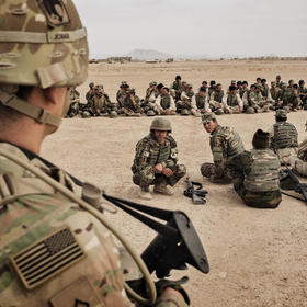 U.S. Army soldiers oversee training of the 215th Corps of the Afghan National Army at Camp Bastion in Helmand Province, Afghanistan on March 22, 2016. (Adam Ferguson/The New York Times)
