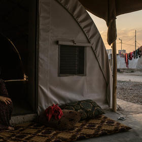 A Yazidi woman in a refugee camp outside Dohuk, Iraq. July 24, 2015. Many Yazidi women were subjected to sexual slavery by the Islamic State. (Mauricio Lima/The New York Times)