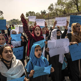 Women protest the Taliban’s decision to cancel the return of high school-aged girls to the classroom, in Kabul, Afghanistan, on March 26, 2022. (Bryan Denton/The New York Times)