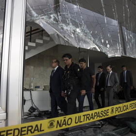Police inspecting the damage at the Supreme Court in Brasilia, Brazil, Jan. 10, 2023. (Victor Moriyama/The New York Times)