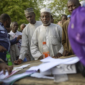 Voters line up as Nigeria elected President Muhammadu Buhari in 2015. As they elect his successor, Nigerians agree on making their democracy more inclusive of their many communal groups. They are debating how to do it. (Samuel Aranda/The New York Times)
