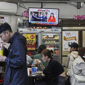 A TV screen shows news about the presidential race in a noodle restaurant in Taipei, Taiwan, on Nov. 15, 2023. (An Rong Xu/The New York Times)
