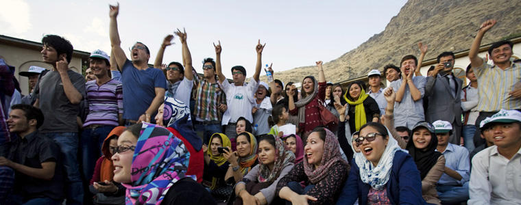 Young Afghans listen to Kabul Dreams, Afghanistan's best known rock band, at an Afghan Youth Voices Festival event allowing men and women to socialize together in Kabul, Afghanistan, June 27, 2013. Though they have embraced western fashion, technology, and music over the last decade, the Afghan youth still appear to be a generation bound to their society's conservative ways, especially when it comes to women's rights. (Christoph Bangert/The New York Times)