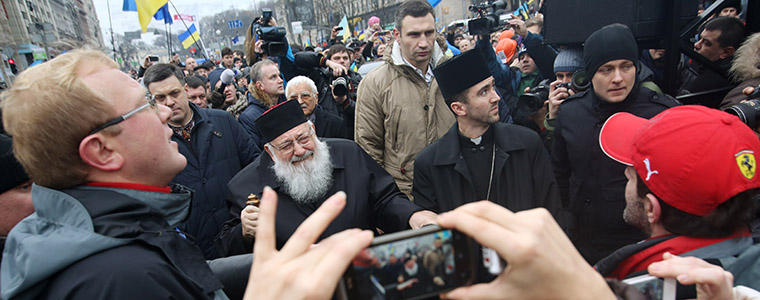Cardinal Lubomyr Husar, arrives to speak to demonstrators at Independence Square in Kiev, Ukraine, Dec. 1, 2013. More than 100,000 people took to the streets of Kiev to demand the resignation of Pres. Yanukovych. Photo Credit: NYT/Joseph Sywenkyj
