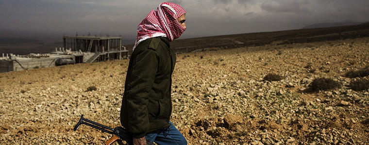 A member of a local patrol in the mainly Christian town of Ras Baalbek in the Bekaa Valley of Lebanon, Oct. 19, 2014. Outbreaks of fighting in Lebanon have heightened fears that the civil war in Syria is spilling over the border, threatening the country’s fragile stability. (Diego Ibarra Sanchez/The New York Times)