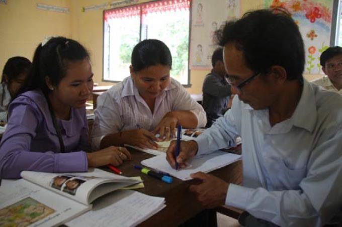 Teachers from central Cambodia work in a course on how to teach the  history of their country’s Khmer Rouge genocide. The session was funded  by USIP. Photo Courtesy of Documentation Center of Cambodia Archives