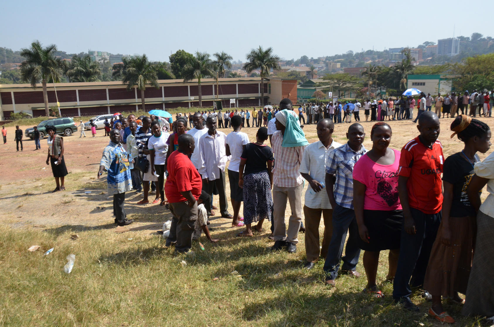 Commonwealth observers at polling stations, as Ugandan people cast their votes.