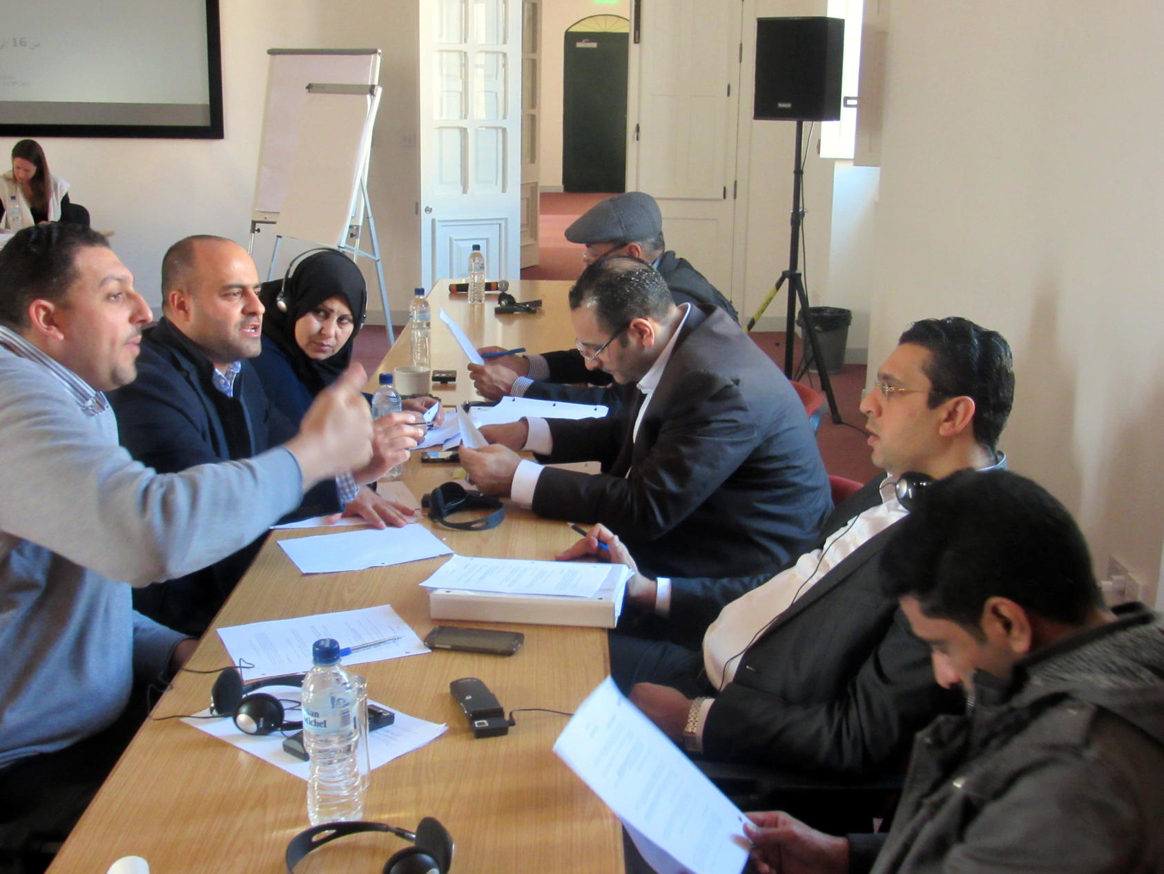 Justice and security officials from Egypt, Lebanon, Libya, Jordan, Tunisia and Yemen take part in a small-group exercise in problem-solving, one of the key features of the USIP course conducted with the International Institute for Justice and the Rule of Law.