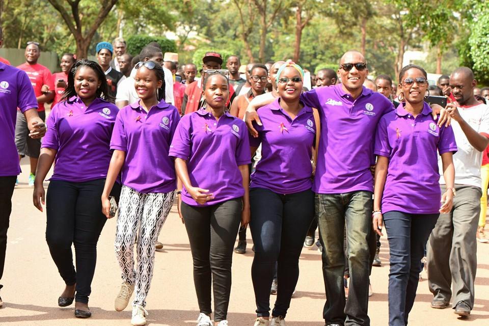 Shubey Nantege (fourth from left) helps lead Go Girl Africa’s participation in a Youth Aids Walk in Kampala, Uganda, in October 2015.  Credit: Go Girl Africa
