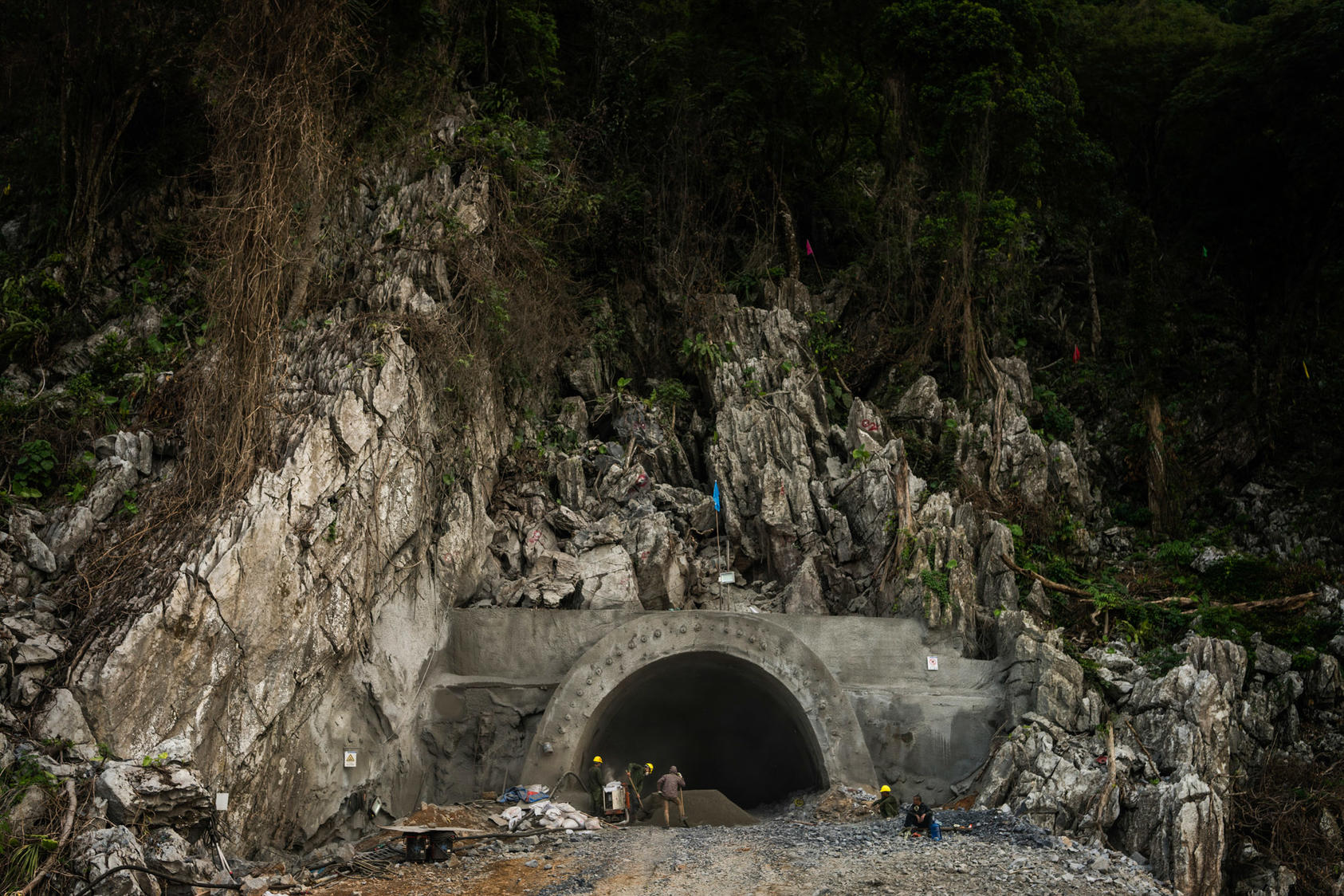 Chinese workers at a tunnel being built for a railway that will connect eight Asian countries, near Vang Vieng, Laos, May 7, 2017. The work is part of President Xi Jinping’s ambitious economic and geopolitical initiative promising more than $1 trillion in infrastructure projects spanning dozens of countries across Asia, Africa and Europe. (Adam Dean/The New York Times) 