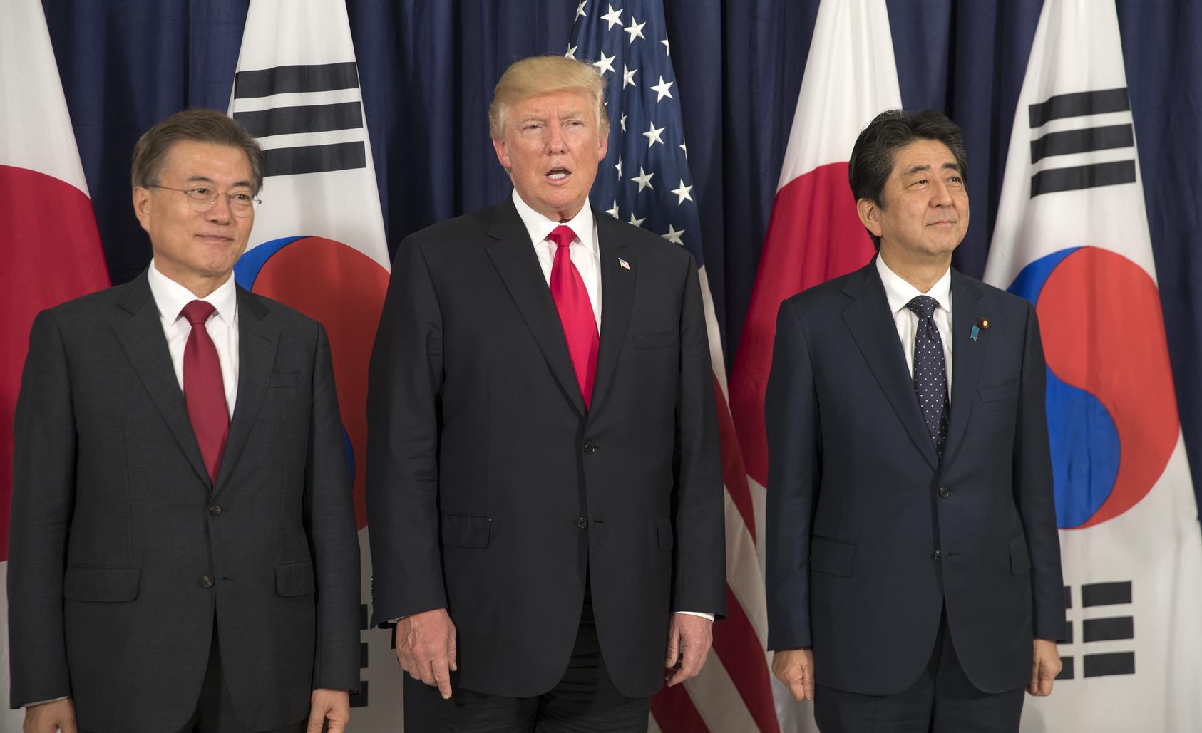 President Donald Trump with President Moon Jae-in of South Korea, left, and Prime Minister Shinzo Abe of Japan, during the G20 summit in Hamburg, Germany, July 6, 2017. As the three allies prepared to meet on the sidelines of the United Nations General Assembly in September, Moon' softer stance towards North Korea has made him the odd man out. (Stephen Crowley/The New York Times)