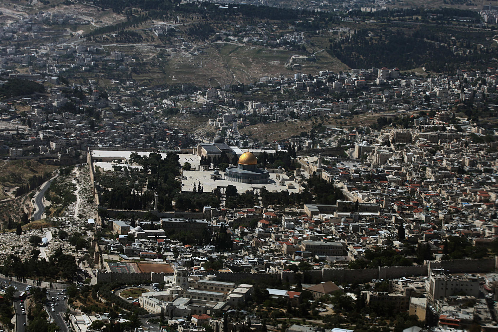 An aerial view of the Old City of Jerusalem, with the Al-Aqsa Mosque at the cente