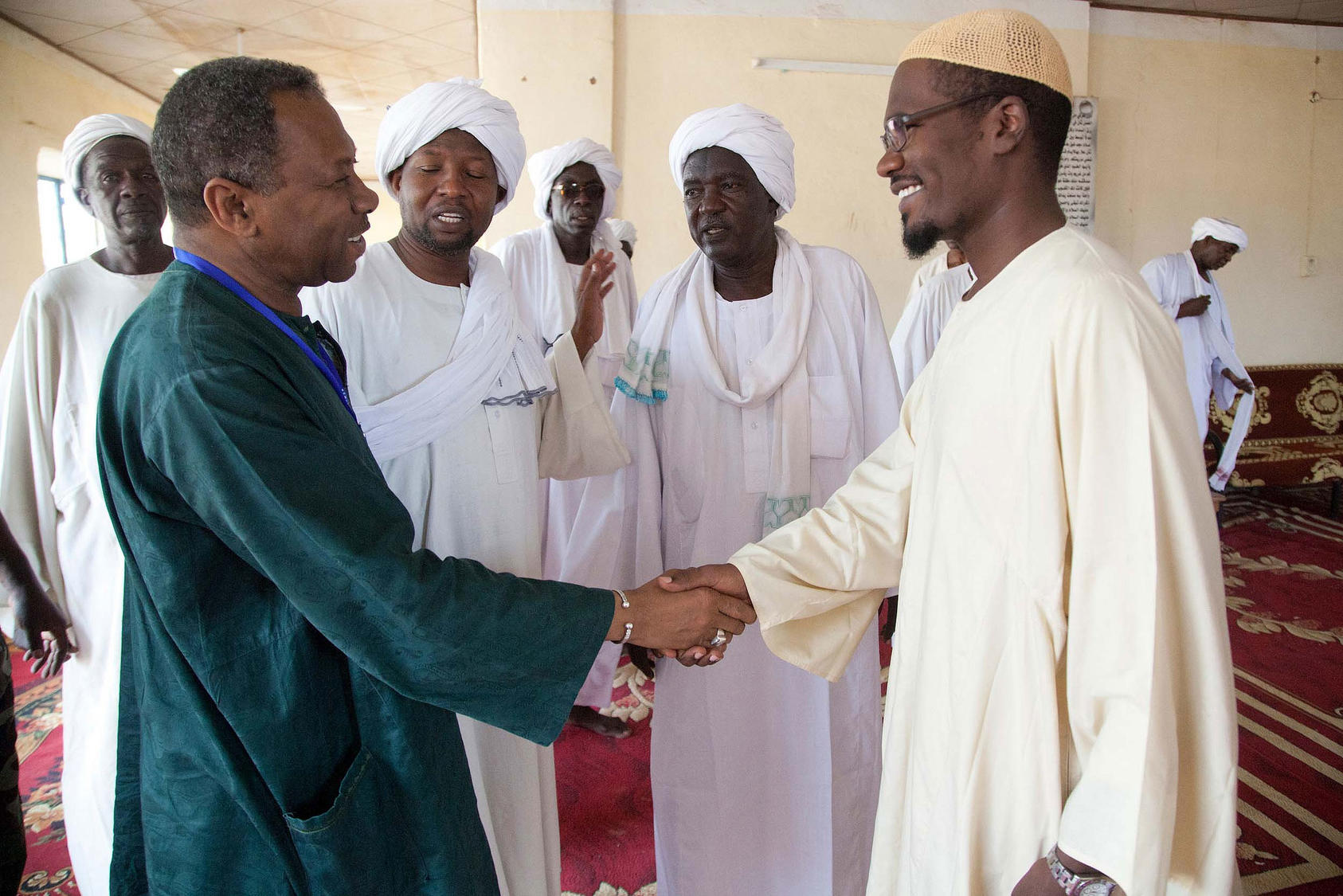 UNAMID Head of Office in Sector North, Hassan Gibril, salutes (right) king Yassir, the head of Al-Berti tribe, in his palace in Mellit, Norh Darfur. (Flickr/UNAMID)