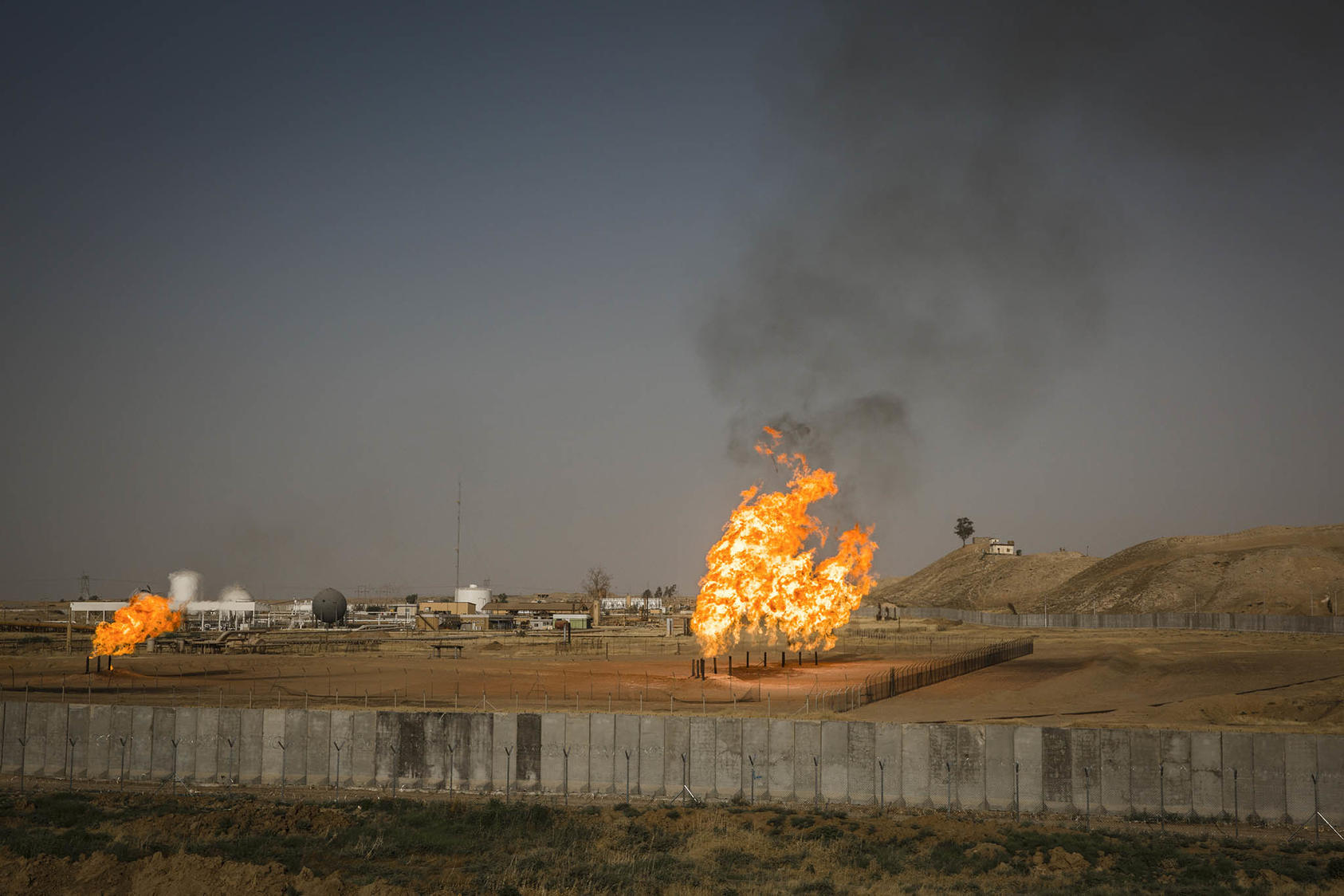 Gas flares at an oil field near Kirkuk, Iraq (Ivor Prickett/The New York Times)