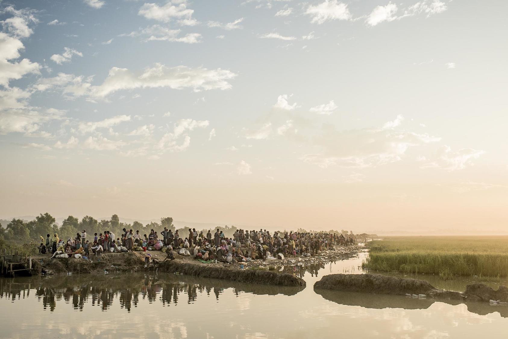 Rohingya refugees after crossing from Burma into Bangladesh near Anjuman Para. (Tomas Munita/The New York Times)