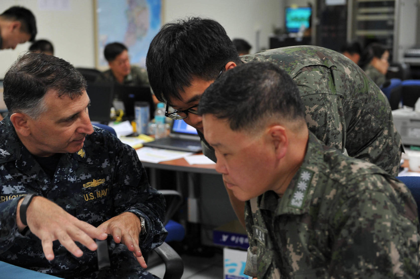 U.S. and South Korean naval officers coordinate logistical operations in 2014 during an annual exercise, Ulchi Freedom Guardian (which is named for a seventh-century Korean general). On June 18, the United States and South Korea announced the cancellation of the 2018 exercise. (U.S. Pacific Fleet)