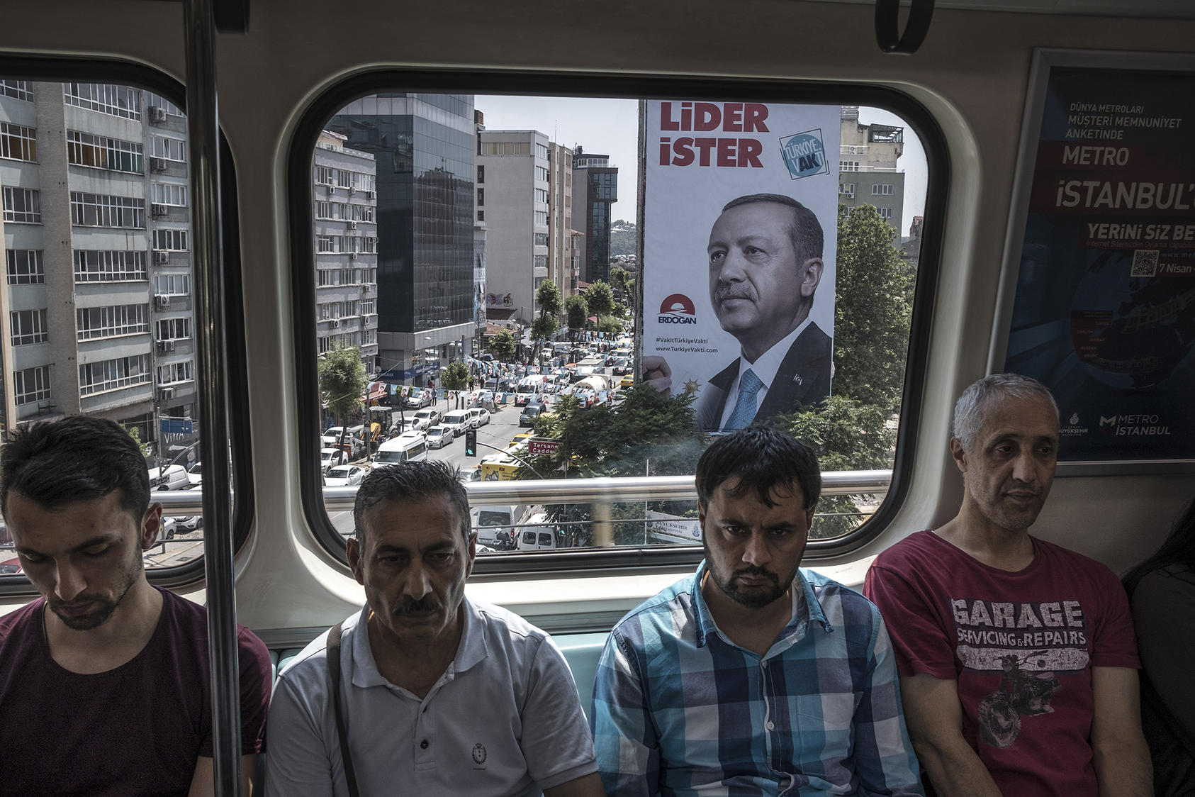 An election poster for President Recep Tayyip Erdogan and Turkey's ruling AK Party on the metro in Istanbul, June 7, 2018. Erdogan uses gargantuan building projects as engines of economic growth and to underline his own strength. (Sergey Ponomarev/The New York Times)