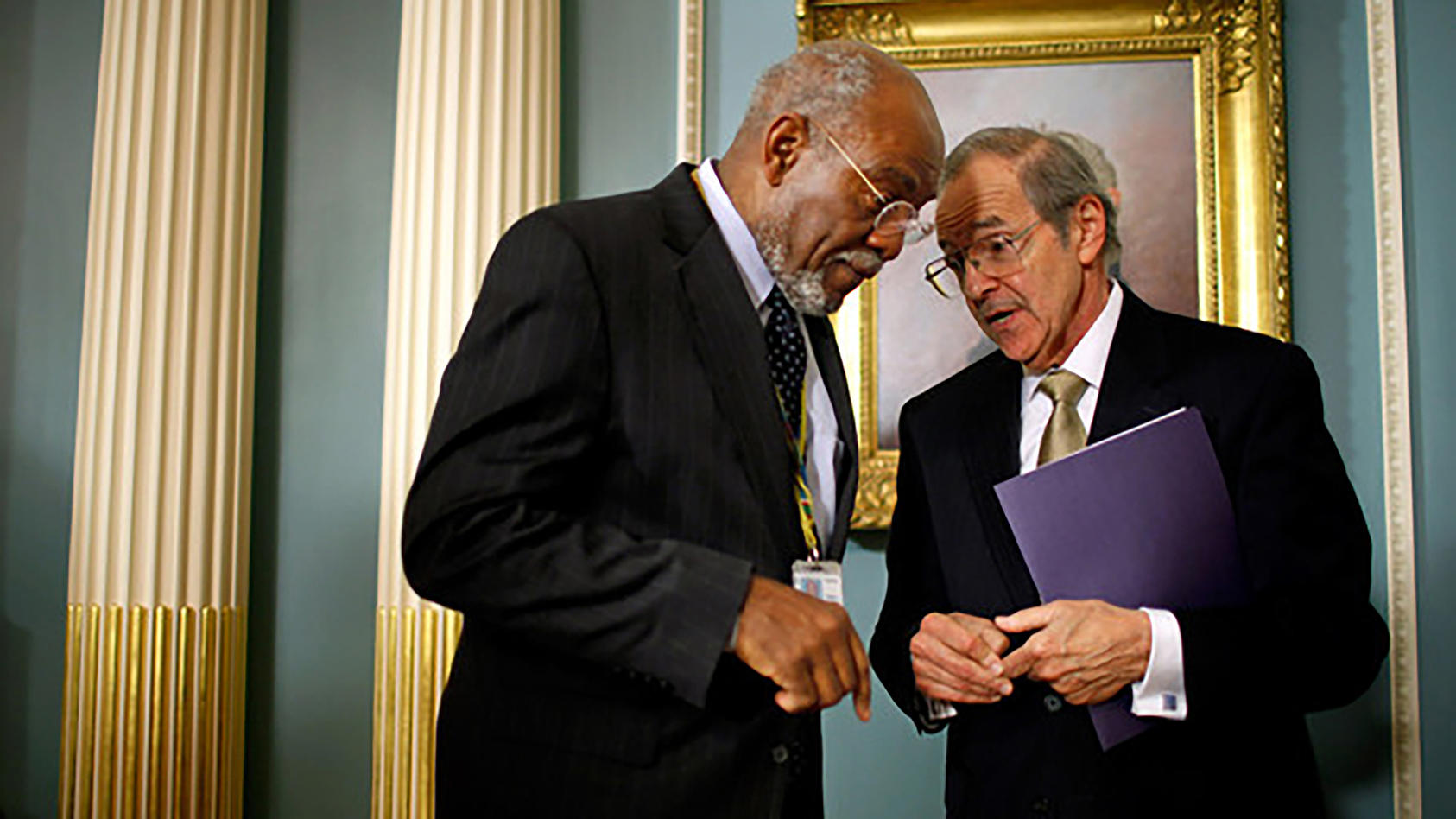 Ambassador Johnnie Carson and Ambassador Princeton Lyman in conversation shortly after Lyman was named special envoy to Sudan, March 31, 2011.