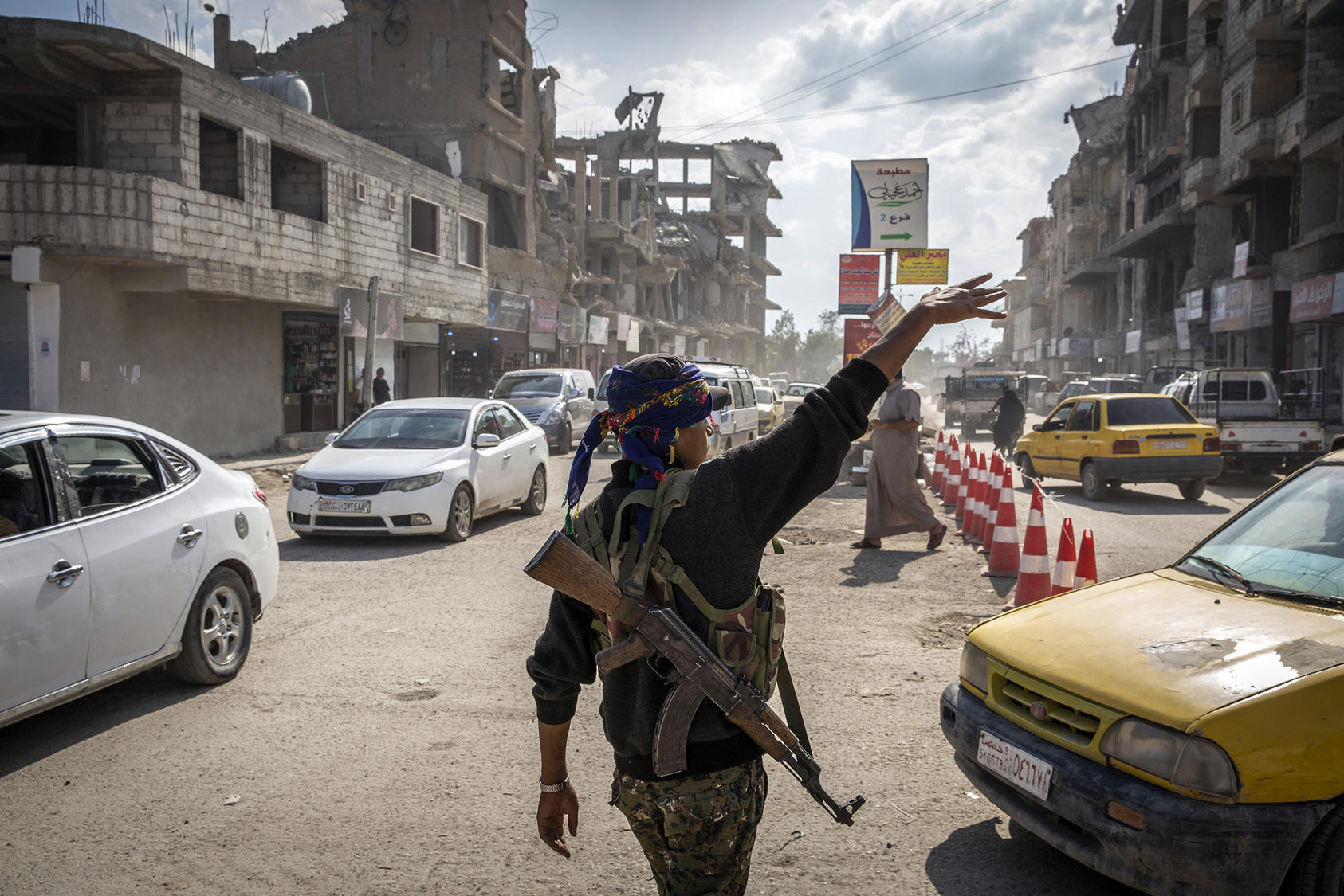 A police officer mans a checkpoint in Raqqa, Syria, on June 13, 2018. Despite the liberation of Raqqa from ISIS, the group remains a potent threat. (Ivor Prickett/The New York Times)