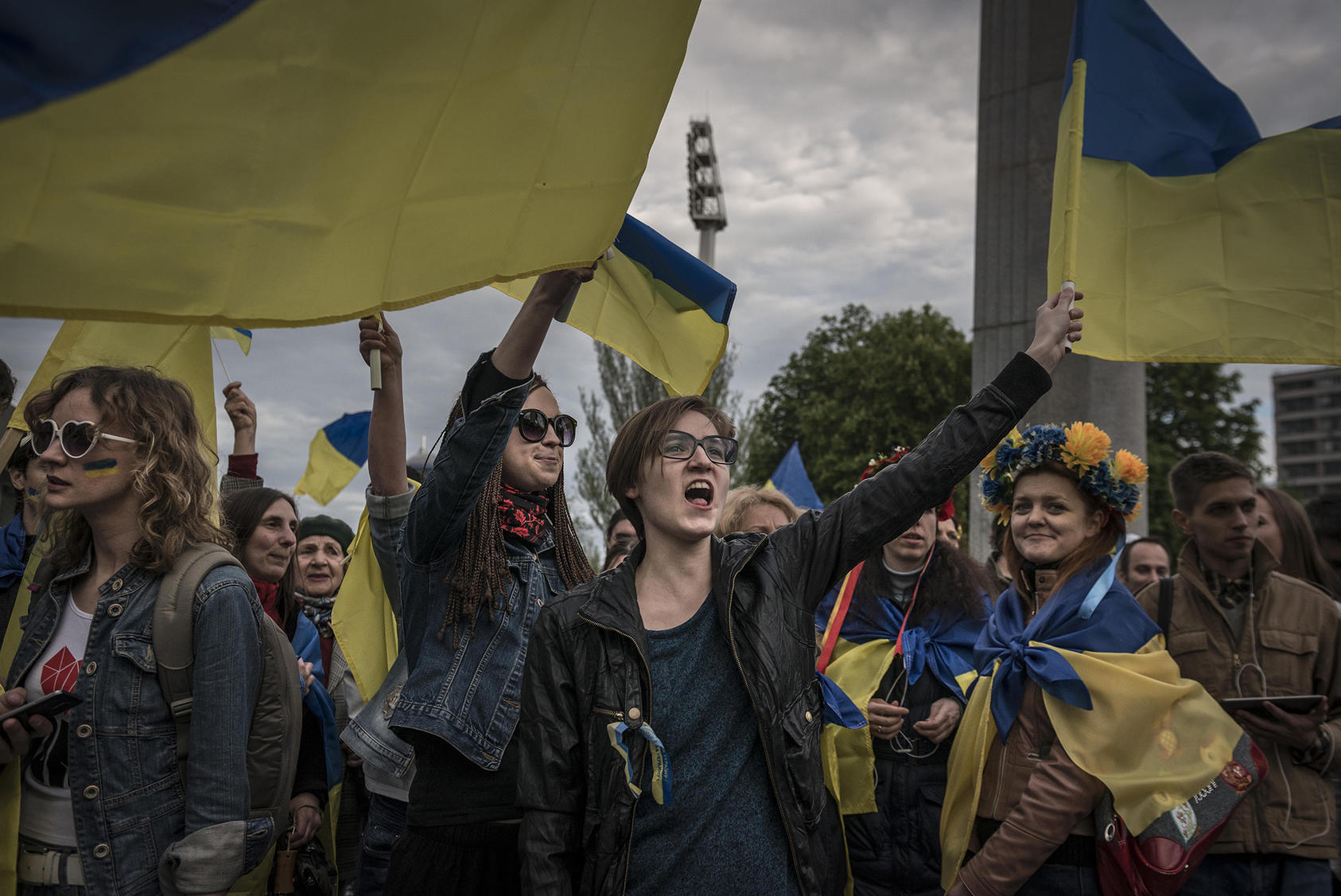 Waving their country's flag, pro-Ukrainians rally for a march in Donetsk, Ukraine, April 28, 2014. (Sergey Ponomarev/The New York Times)