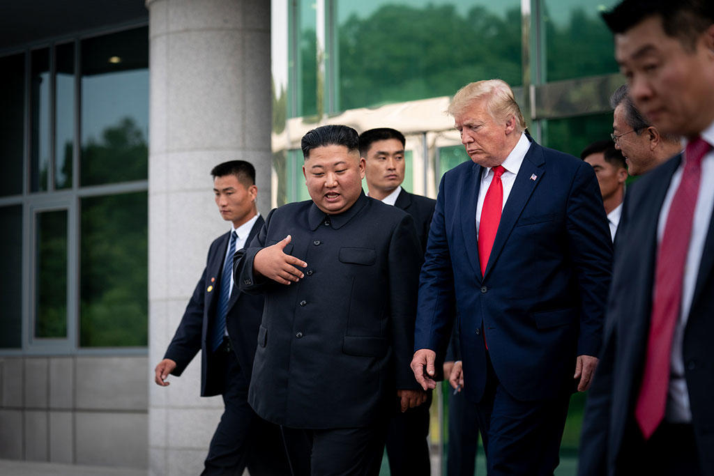 President Donald Trump and Kim Jong Un, the North Korean leader, walk out after a bilateral meeting at the Freedom House on the South Korean side of the truce village of Panmunjom, June 30, 2019. (Erin Schaff/The New York Times)