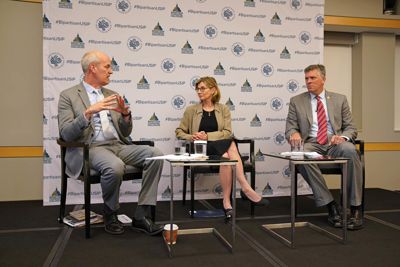 From left to right: Rep. Rick Larsen (D-WA), USIP’s Nancy Lindborg and Rep. Darin LaHood (R-IL).
