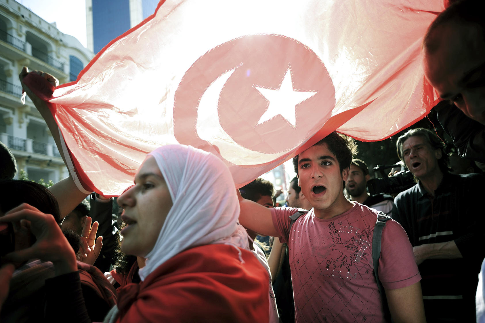 Protesters march along Bourguiba Avenue in Tunis, Tunisia, April 10, 2012. (Samuel Aranda/The New York Times)