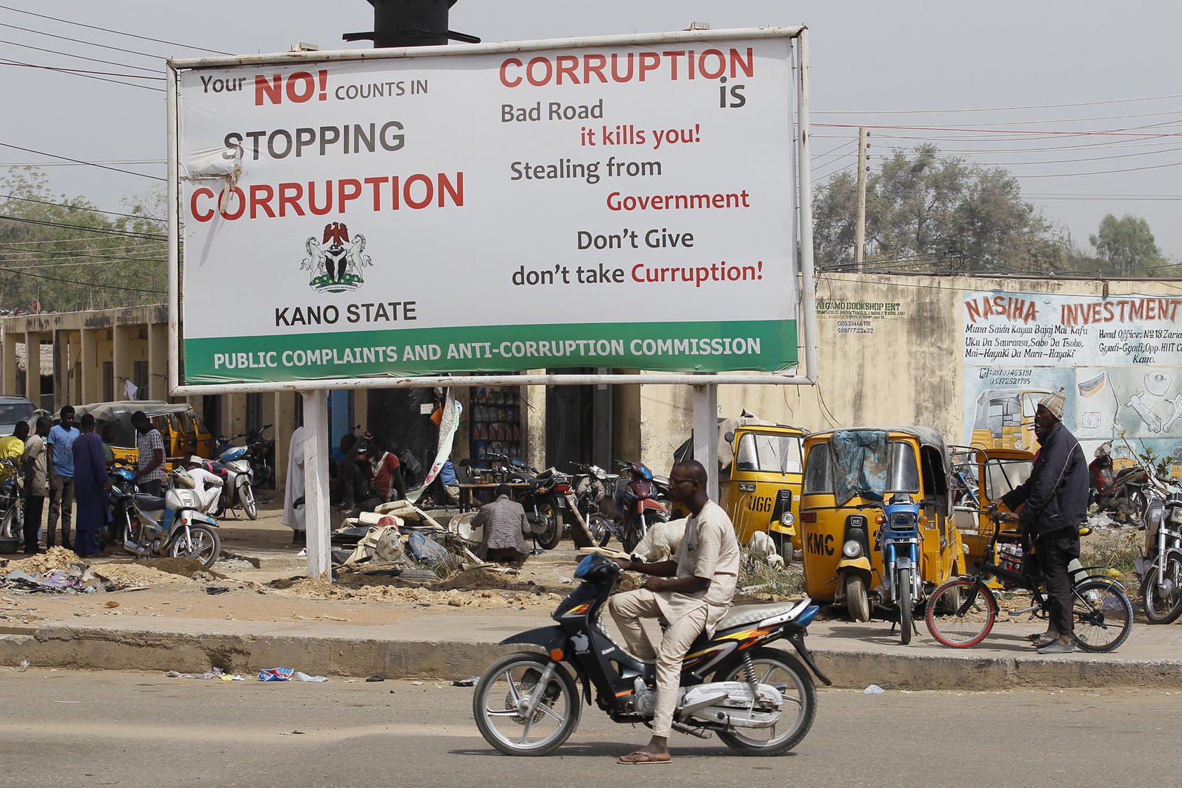 A majority of Nigerians believe they risk retaliation or other consequences when they report incidents of corruption. Anti-corruption activists and their organizations can help encourage safe reporting. (Akintunde Akinleye/Reuters)