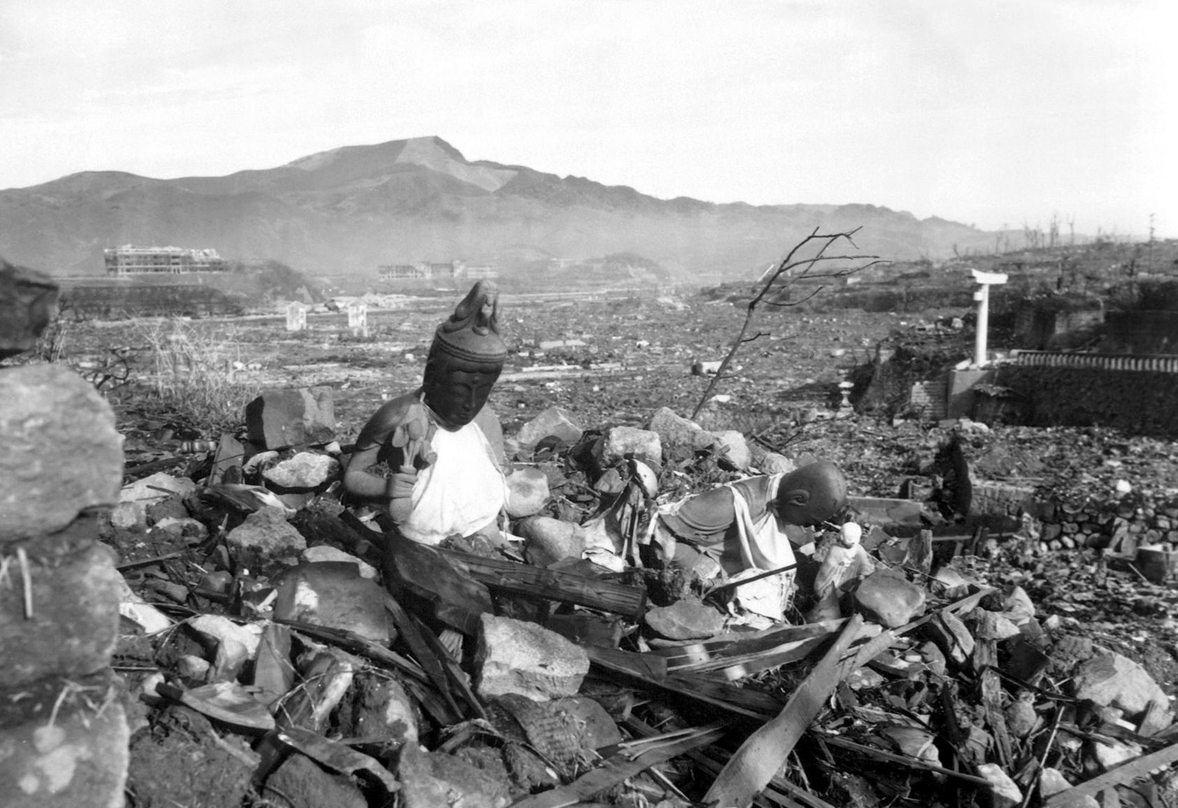 The city of Nagasaki was an irradiated debris field—here with the remains of a temple in the foreground—when Navy Ensign Mike Mapes arrived to help keep the peace following its destruction with the atom bomb. (Corporal Lynn P. Walker, Jr./USMC)