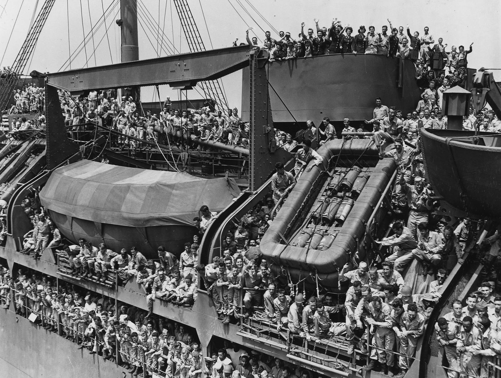 U.S. troops return to New York aboard the USS General Harry Taylor from their service in World War II. Veterans of that war later led in the campaign to establish the U.S. Institute of Peace. (National Archives)