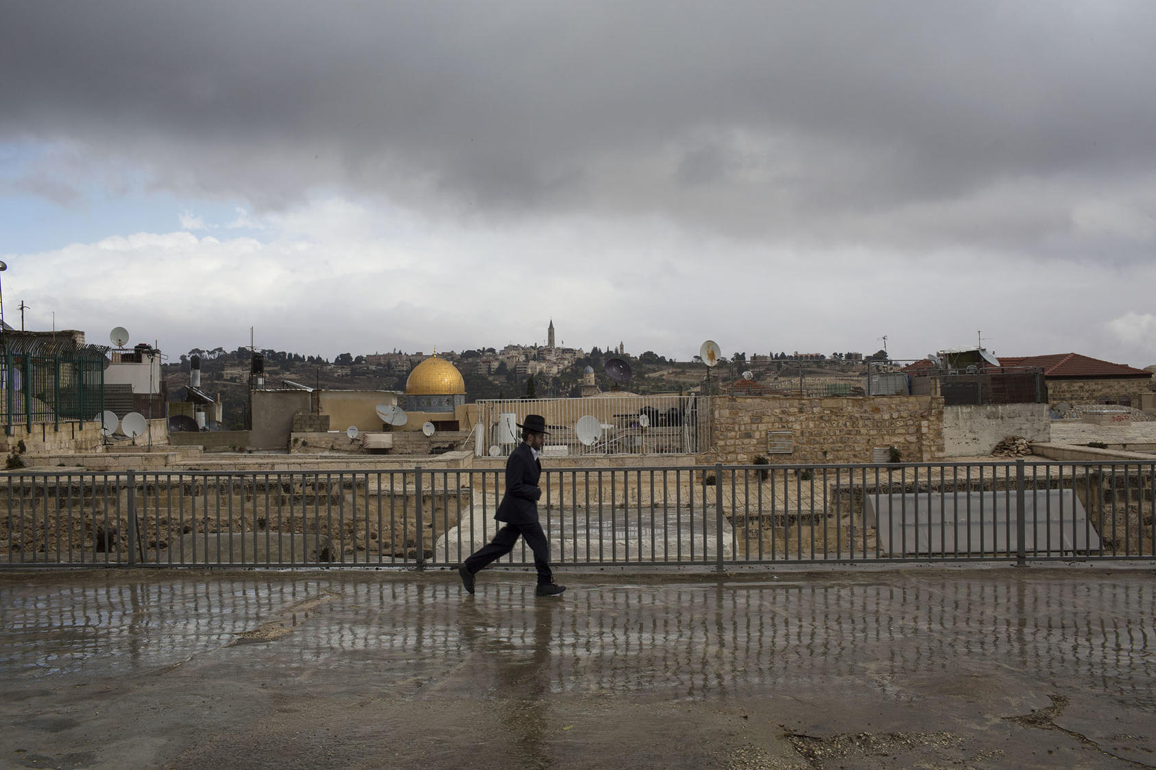 An ultra-Orthodox Jewish man walking in the Old City of Jerusalem, Dec. 6, 2017. (Uriel Sinai/The New York Times)