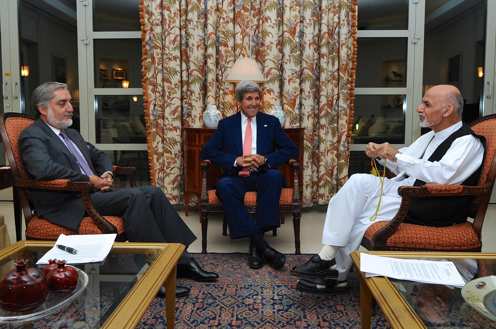 Former Secretary of State John Kerry sits with Afghan Abdullah Abdullah, left, and Ashraf Ghani, right, in Kabul, Afghanistan on July 12, 2014, after he helped broker an agreement to resolve the disputed presidential election. (U.S. State Department)