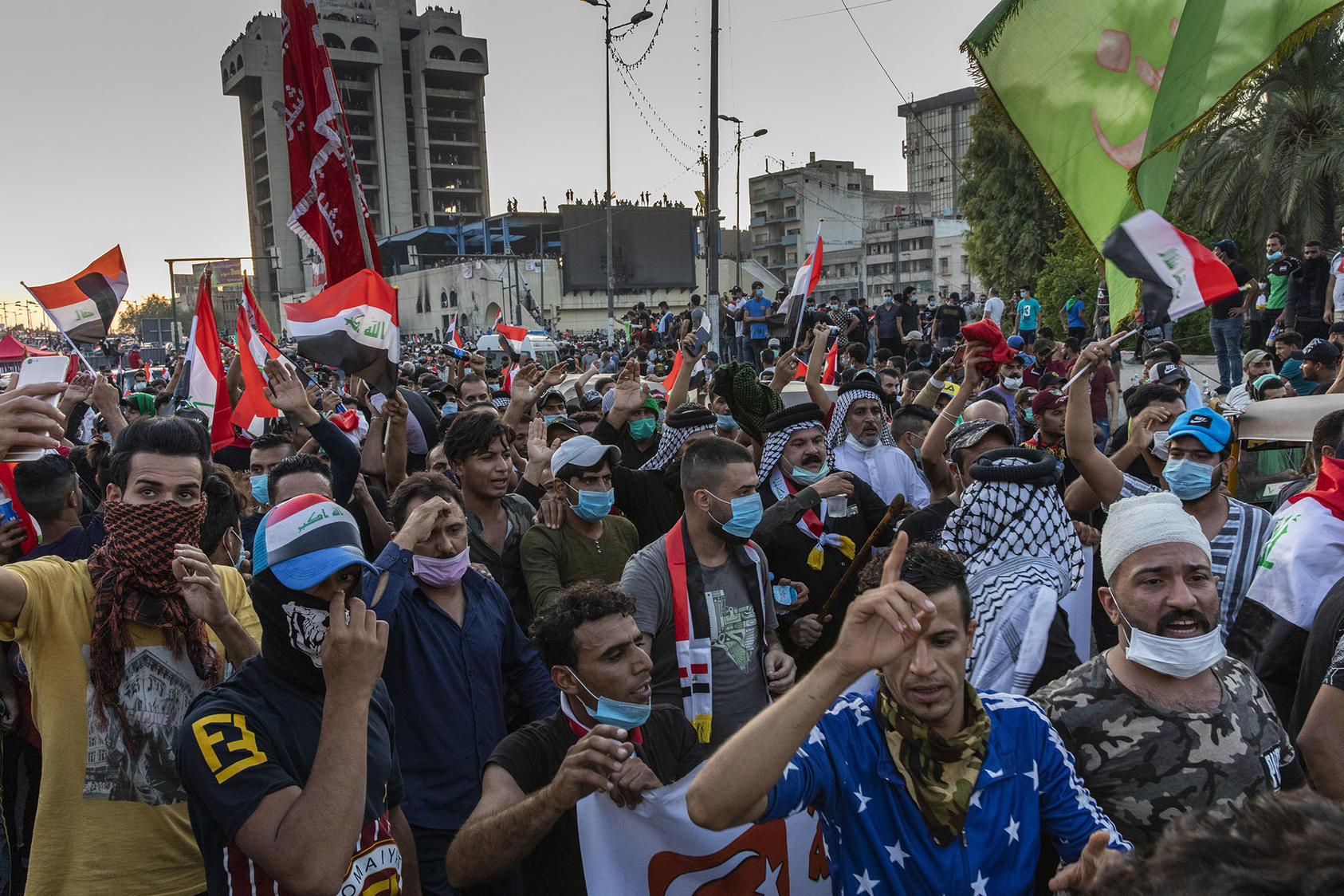 Protesters fill Tahrir Square in Baghdad, Oct. 26, 2019. Mass protests are declining worldwide in response to the COVID-19 pandemic, so movements are adapting their tactics in response to a changing world. (Ivor Prickett/The New York Times)