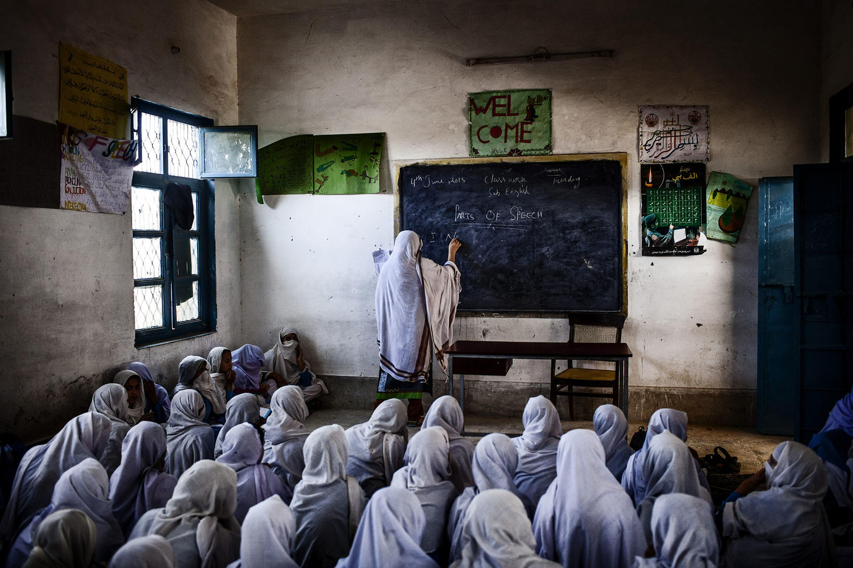 Female students during a class at a school in Nowshera, Pakistan, June 4, 2013. (Diego Ibarra Sanchez/The New York Times)