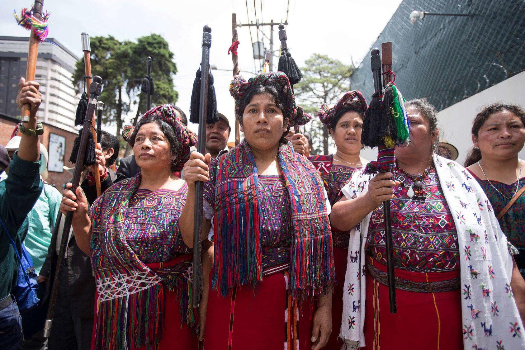 Indigenous leaders stand in support of Ivan Velasquez, commissioner of the International Commission Against Impunity in Guatemala, on August 29, 2017. (Moises Castillo/AP)
