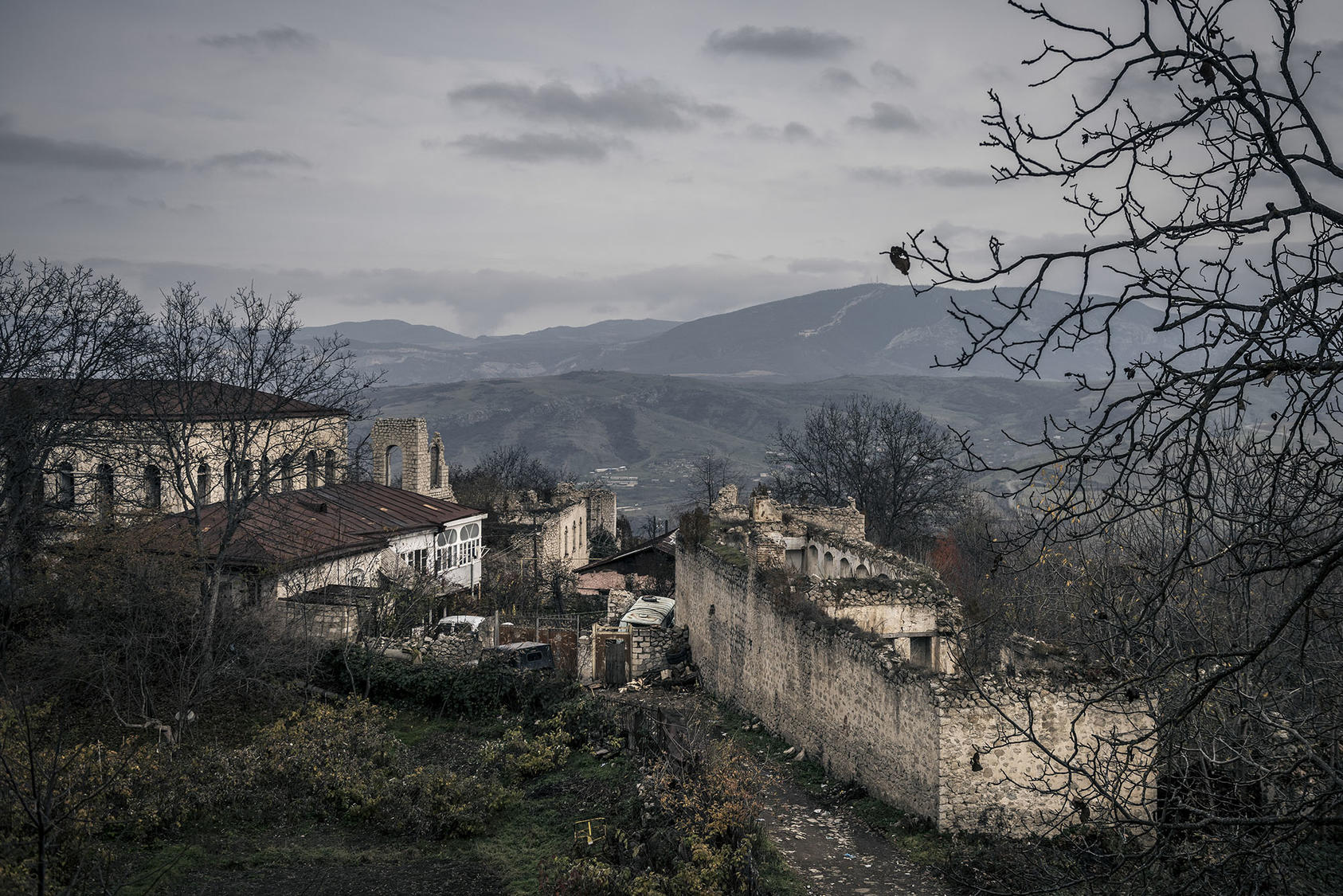 Ruined buildings stand in the Nagorno-Karabakh town of Shusha (called Shushi by Armenians) two decades after fighting forced Azerbaijanis there and elsewhere to flee. The resurgence of war now risks a wider conflict. (Sergey Ponomarev/The New York Times)